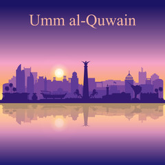 Obraz premium Umm al-Quwain silhouette on sunset background