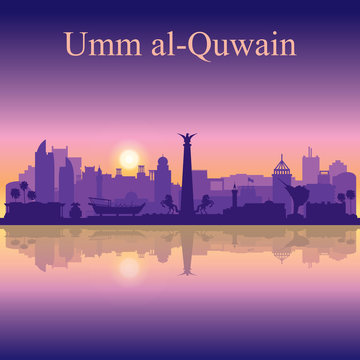 Umm al-Quwain silhouette on sunset background
