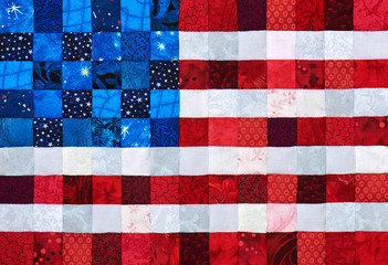 Square pieces of fabrics selected and stitched like a flag of USA