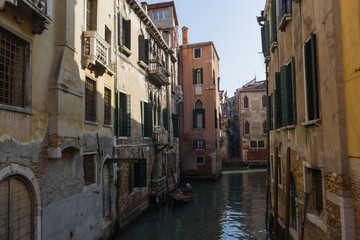 Fototapeta na wymiar A canal between old venetian buildings, Venice, Italy