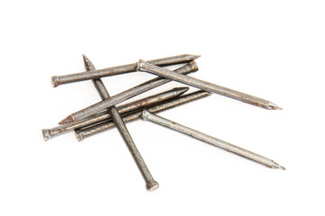 Pile of nails on white background