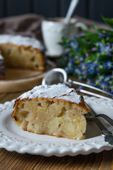 Apple vegan pie with coffee and snowdrops