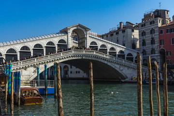 Fototapeta na wymiar The Rialto Bridge, one of the most famous landmarks in Venice, Italy