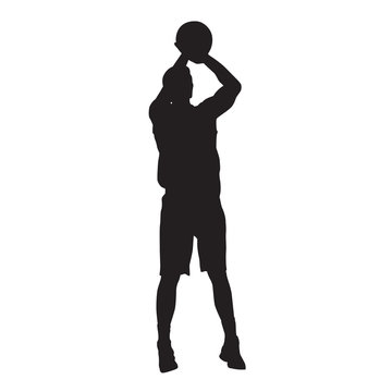 Basketball player jumping and shooting ball. Vector silhouette