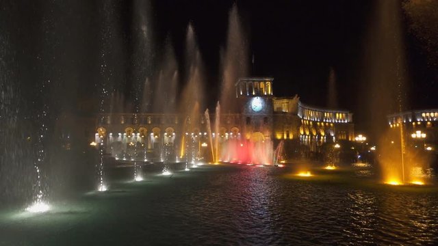 Slow motion shot of dancing fountains at night in Yerevan, Armenia