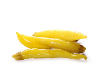 Spicy, hot yellow peppers isolated on white background