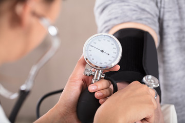 Doctor Measures Her Blood Pressure