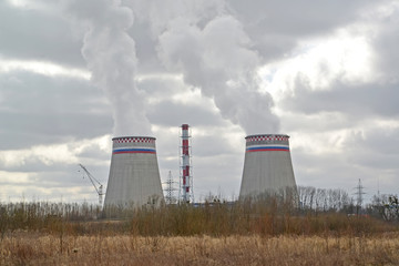 Fototapeta na wymiar View of coolers of the Kaliningrad CHPP-2 in spring day