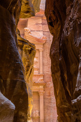 First Sight View of Petra´s Treasury Amidst Rocks at the Siq