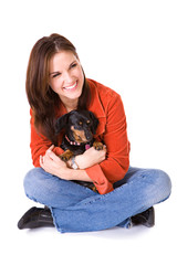 Obraz premium Pets: Woman Holds Pet Dachshund In Lap