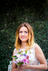 Portrait of a beautiful smiling bride outdoor