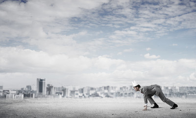 King businessman in elegant suit running and business center at 