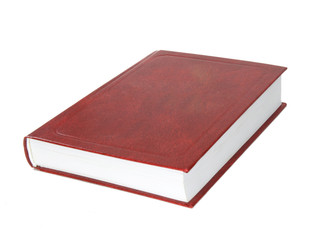 Closed beautiful isolated thick book with a red cover on a white background