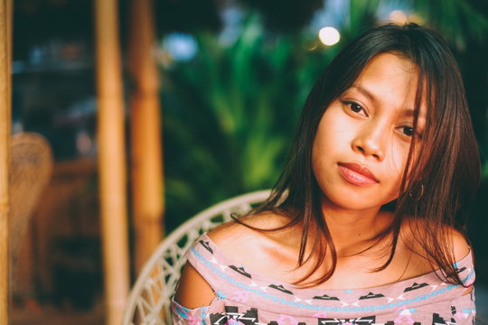 Portrait Of A Beautiful Asian Girl Chilling Out During The Night On The Beach