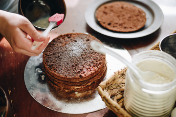 woman hands makeing cake