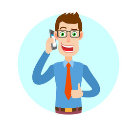 Businessman talking on mobile phone and showing thumb up