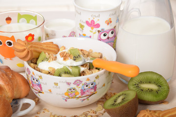 Delicious breakfast for children with kiwi