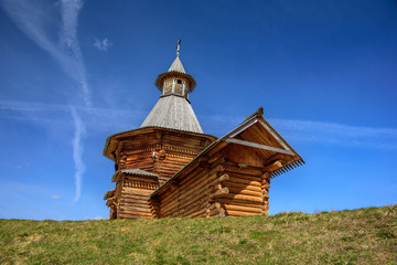 Spring view of the wooden Travel Tower of the Nikolo-Korelsky Monastery in the Kolomenskoye Museum at sunny day, Moscow, Russia