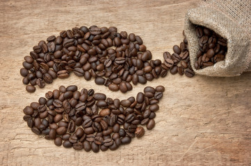 Fototapeta na wymiar coffee beans on the board