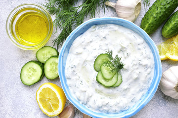 Tzatziki - yoghurt sauce with cucumber and dill.Top view .