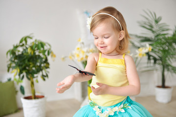 little girl with a butterfly