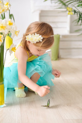 little girl with a butterfly
