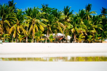 Landscape of paradise tropical island with white sand beach