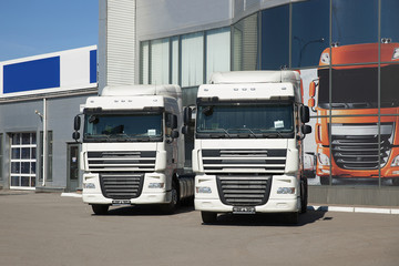 White trucks stand in line - 151352469