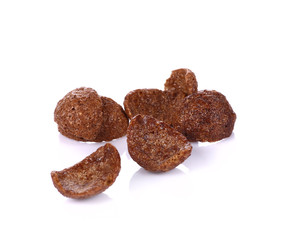Bunch of chocolate cereals on white background