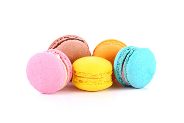 French colorful macarons isolated on white