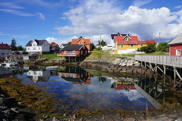 Colorful wooden buildings in Henningsvaer, a picturesque fishing village located on the Southern coast of Austvagoya in the Lofoten Islands in Norway
