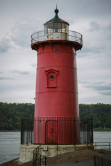 Little red lighthouse under Washington Bridge on overcast day - 151368890