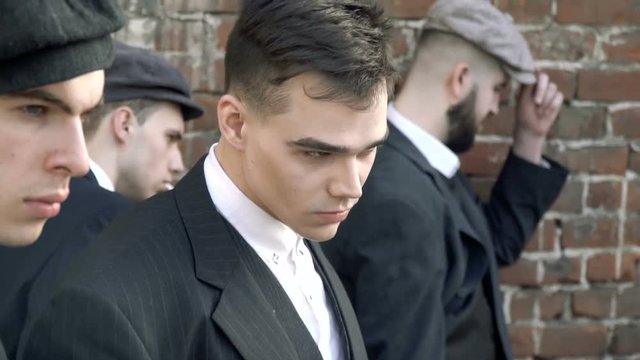 Boys in the costumes from the TV series Peaky blinders