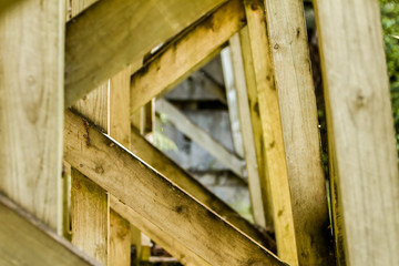 abstract wooden pattern fence contruction on natural background
