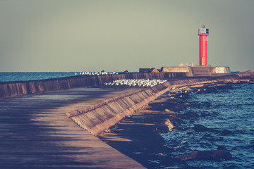 Breakwater dam with lighthouse