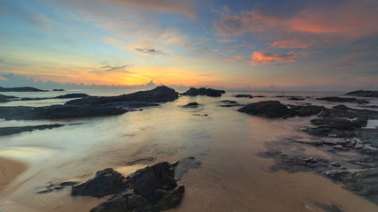Fototapeta na wymiar beautiful scenery of sunrise at beach side of Pantai Tanjung Jara Dungun, Malaysia