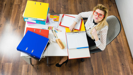 Happy business woman in office