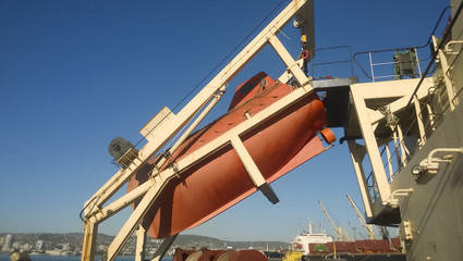 Fototapeta premium A lifeboat in case of an accident in the port or on a ship. The