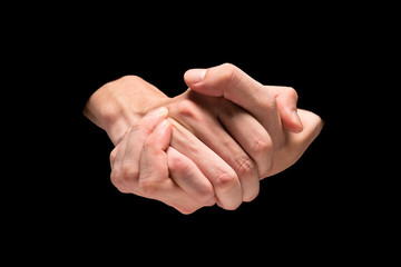 Male hands on a black background.