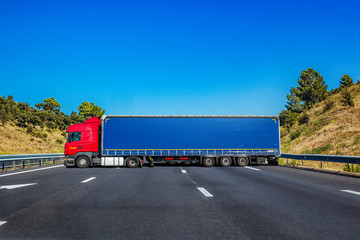Big truck across road