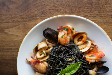 Black spaghetti pasta with an assortment of seafood