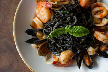 Black spaghetti pasta with an assortment of seafood