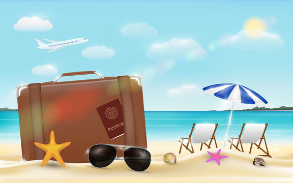Suitcase and sun glasses on sea beach