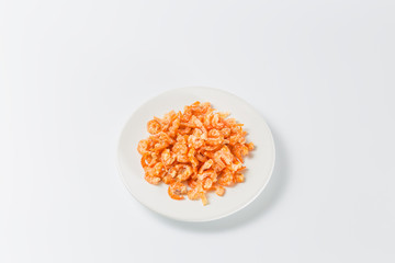 dried shrimp in white dish on white background