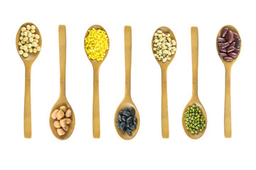 Mixed beans on wood spoon background isolated white background.