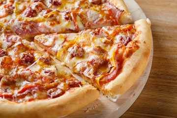 Close-up view of piece of pizza