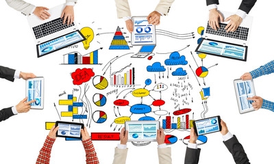 Top view of businesspeople sitting at table and using gadgets