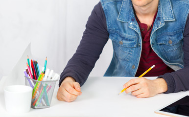 man working on tablet