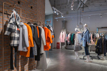 Fototapeta na wymiar Indoor shopping, fashion women's clothes