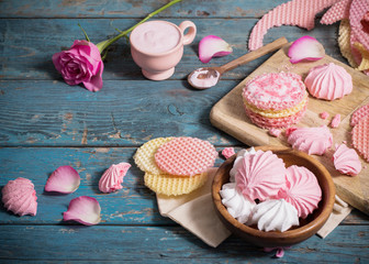pink dessert on old dark wooden table
